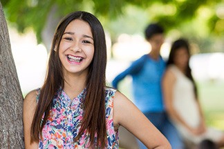 Girl with braces smiling