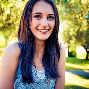 Girl with braces smiling